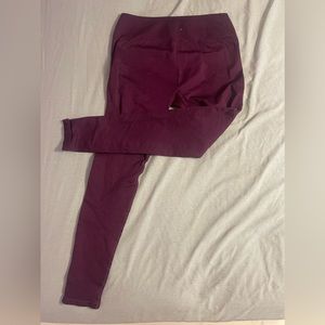 Size S fabletics leggings in a plum color